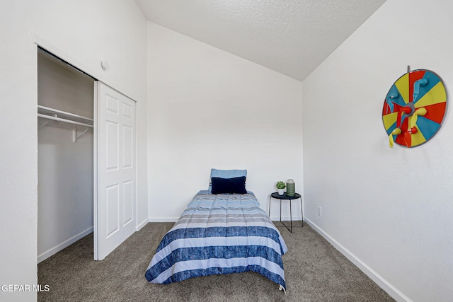 6929 Canyon View Ln, El Paso, TX 79912 - carpeted bedroom with vaulted ceiling, baseboards, and a textured ceiling