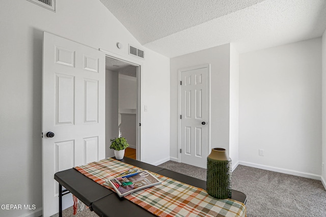 6929 Canyon View Ln, El Paso, TX 79912 - office area with a textured ceiling, dark carpet, and baseboards