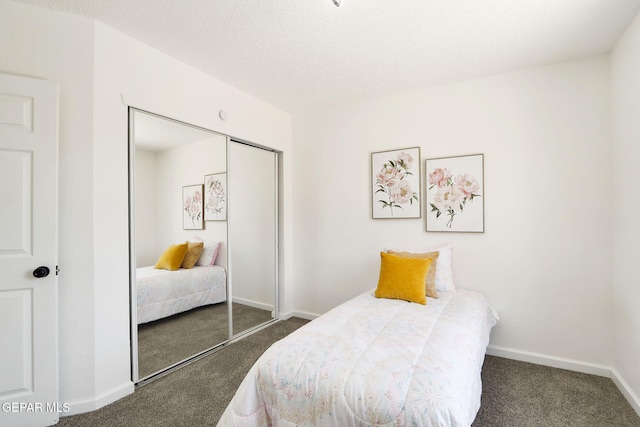 6929 Canyon View Ln, El Paso, TX 79912 - carpeted bedroom featuring a closet and baseboards