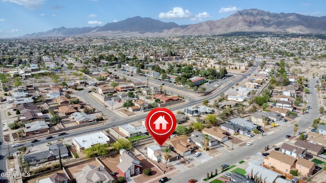 6929 Canyon View Ln, El Paso, TX 79912 - aerial overview of property's location with a mountain backdrop and nearby suburban area