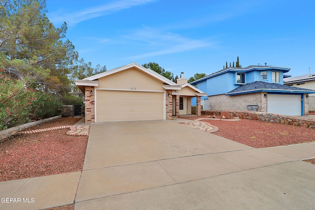 12013 Meadow Gate Dr, El Paso, TX 79936 - view of front facade featuring brick siding, concrete driveway, a garage, and a chimney