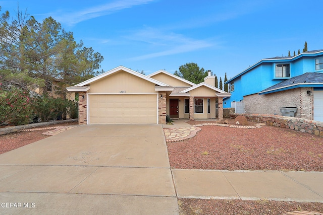 12013 Meadow Gate Dr, El Paso, TX 79936 - single story home with brick siding, an attached garage, concrete driveway, and a chimney