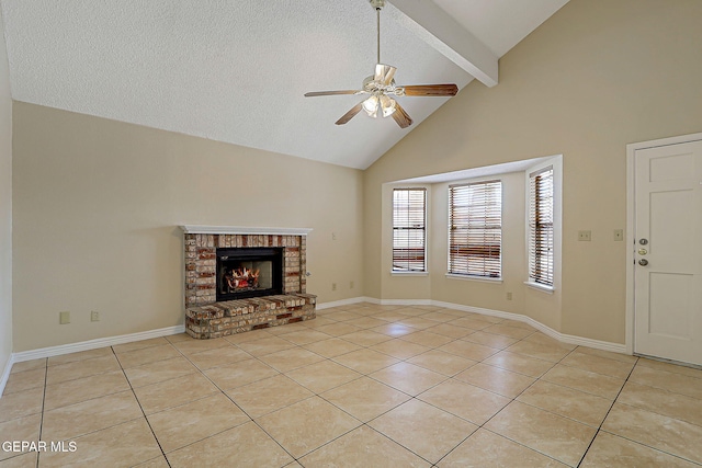 12013 Meadow Gate Dr, El Paso, TX 79936 - unfurnished living room with light tile patterned floors, ceiling fan, high vaulted ceiling, beamed ceiling, and a fireplace