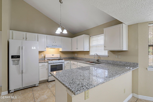 12013 Meadow Gate Dr, El Paso, TX 79936 - kitchen featuring white appliances, under cabinet range hood, a sink, a peninsula, and white cabinets