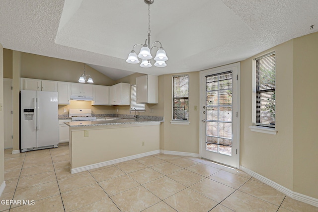 12013 Meadow Gate Dr, El Paso, TX 79936 - kitchen featuring white appliances, a chandelier, a textured ceiling, under cabinet range hood, and light tile patterned flooring