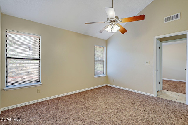 12013 Meadow Gate Dr, El Paso, TX 79936 - empty room featuring light colored carpet, lofted ceiling, ceiling fan, and baseboards