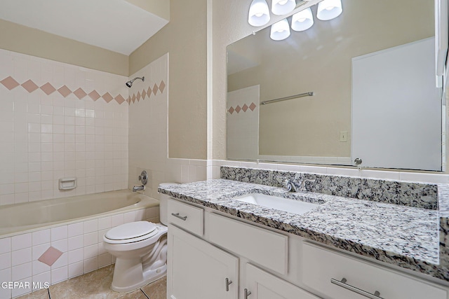 12013 Meadow Gate Dr, El Paso, TX 79936 - bathroom featuring vanity, toilet, shower / tub combination, and tile patterned floors