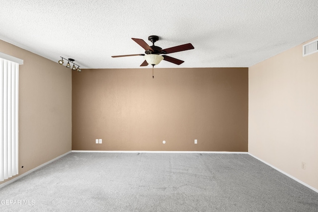 500 Tawny Oaks Pl, El Paso, TX 79912 - carpeted spare room with a ceiling fan, a textured ceiling, and baseboards