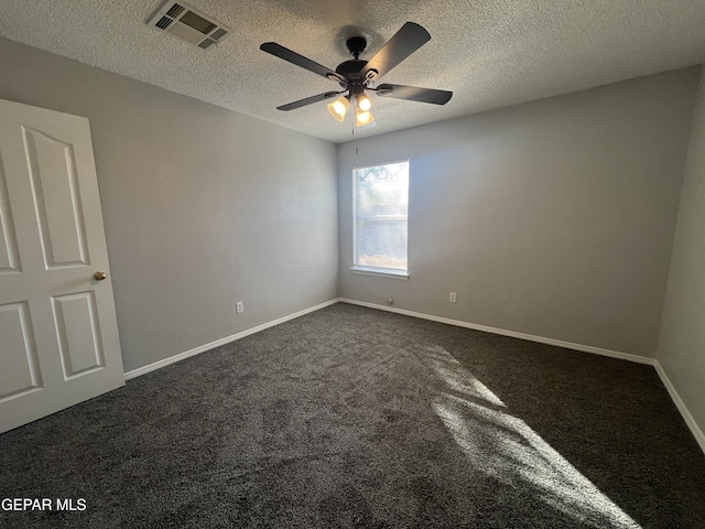 10256 Valle Suave Dr, El Paso, TX 79927 - empty room with dark colored carpet, ceiling fan, baseboards, and a textured ceiling