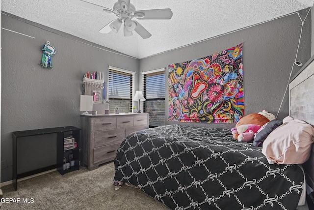 11457 David Carrasco Dr, El Paso, TX 79936 - carpeted bedroom featuring a textured ceiling, a textured wall, and a ceiling fan