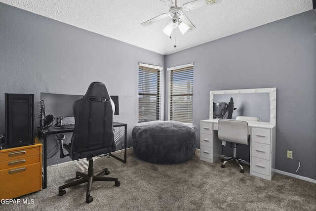 11457 David Carrasco Dr, El Paso, TX 79936 - office area featuring ceiling fan, carpet flooring, a textured wall, a textured ceiling, and baseboards