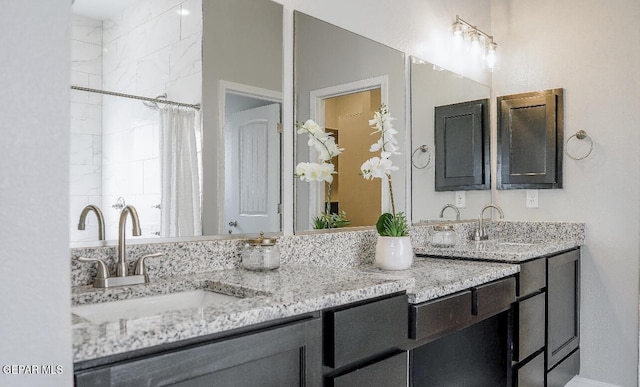 3920 Aspiration St, El Paso, TX 79938 - full bathroom with double vanity and a shower with shower curtain
