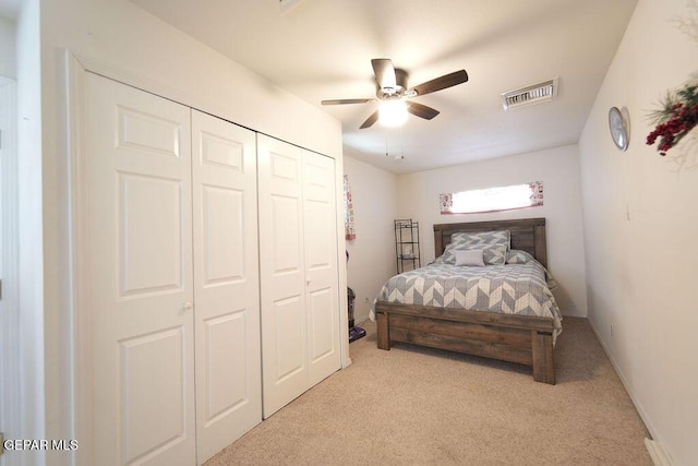 4313 Okeefe Dr, El Paso, TX 79902 - bedroom featuring light carpet, a closet, and a ceiling fan