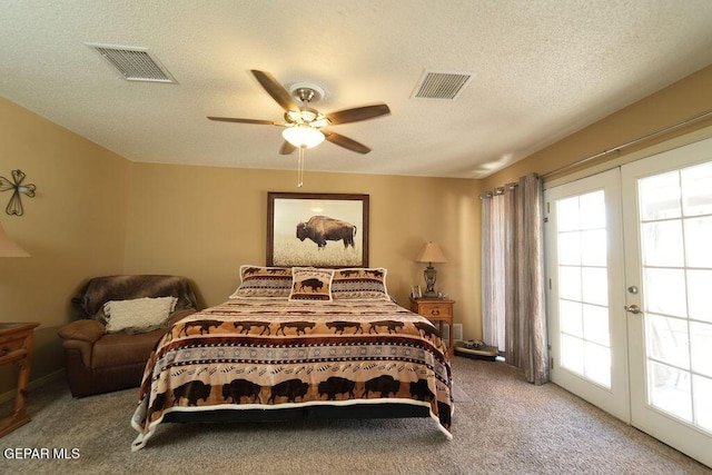 4313 Okeefe Dr, El Paso, TX 79902 - carpeted bedroom featuring multiple windows, french doors, access to outside, and a textured ceiling
