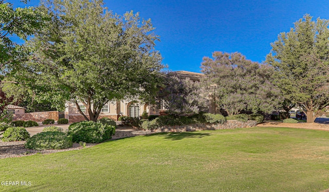 5500 Rancho Sereno Pl, El Paso, TX 79932 - view of front of home with a front lawn