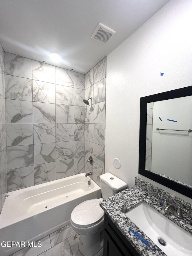 15221 Apex Ct, El Paso, TX 79938 - bathroom with marble look tile flooring, shower / bath combination, vanity, and toilet