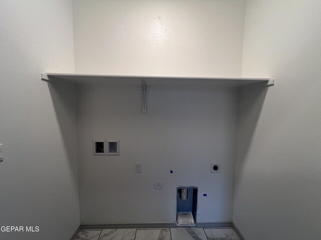 15221 Apex Ct, El Paso, TX 79938 - laundry area featuring light marble finish floors, gas dryer hookup, washer hookup, and hookup for an electric dryer