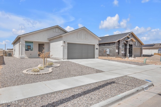 15221 Apex Ct, El Paso, TX 79938 - single story home featuring a garage, driveway, and stucco siding