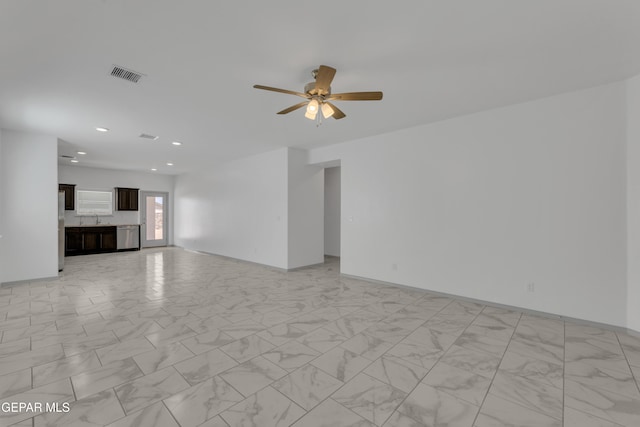 15221 Apex Ct, El Paso, TX 79938 - unfurnished living room featuring a ceiling fan, light marble finish flooring, and recessed lighting