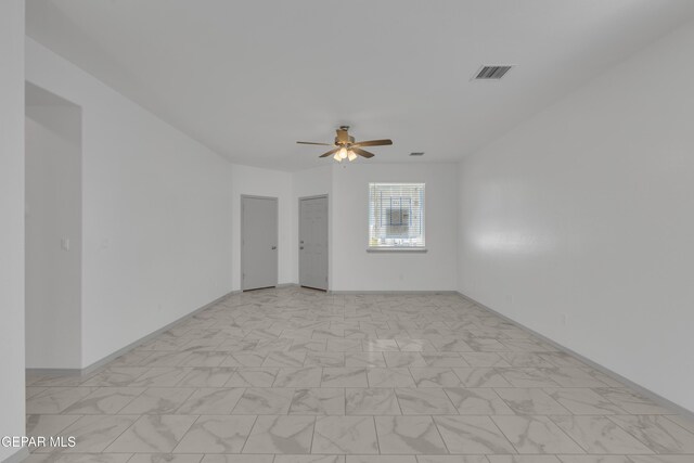 15221 Apex Ct, El Paso, TX 79938 - spare room with a ceiling fan and light marble finish flooring