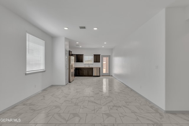 15221 Apex Ct, El Paso, TX 79938 - unfurnished living room with recessed lighting and light marble finish floors