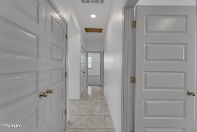 15221 Apex Ct, El Paso, TX 79938 - hallway featuring light marble finish flooring and baseboards