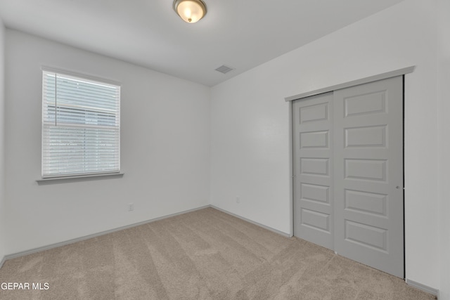 15221 Apex Ct, El Paso, TX 79938 - unfurnished bedroom featuring carpet and a closet