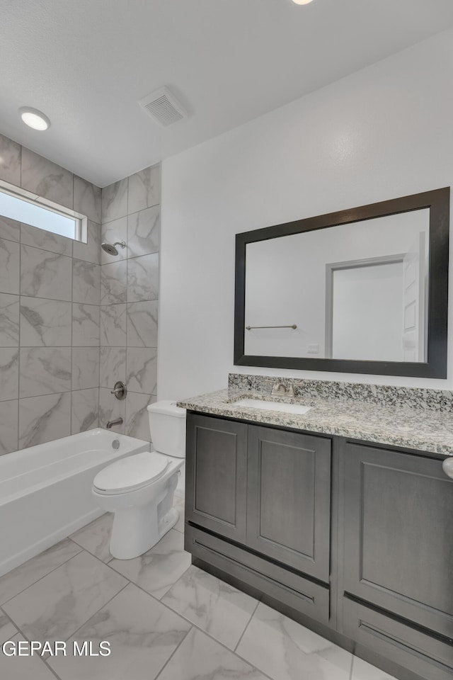 15221 Apex Ct, El Paso, TX 79938 - bathroom with marble finish flooring, vanity, and washtub / shower combination