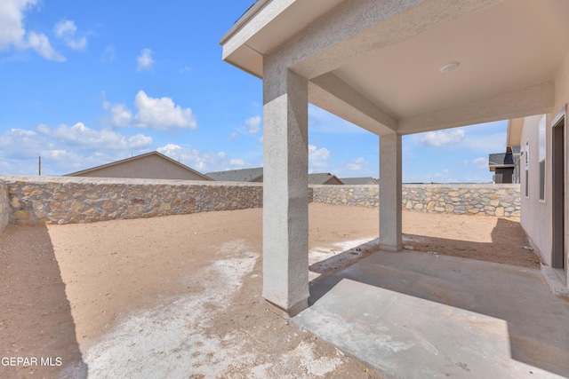 15221 Apex Ct, El Paso, TX 79938 - fenced backyard featuring a patio area