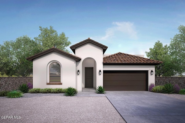 891 Dewsbury Way, El Paso, TX 79928 - mediterranean / spanish-style home featuring an attached garage, concrete driveway, a tile roof, and stucco siding