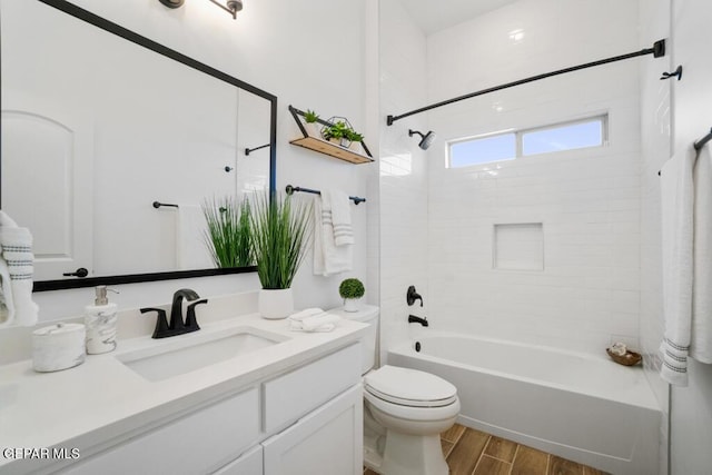 891 Dewsbury Way, El Paso, TX 79928 - bathroom featuring vanity, shower / bath combination, wood finished floors, and toilet