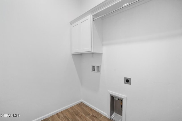 891 Dewsbury Way, El Paso, TX 79928 - laundry room with electric dryer hookup, cabinet space, wood finished floors, washer hookup, and baseboards