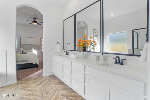 891 Dewsbury Way, El Paso, TX 79928 - full bath with ceiling fan, double vanity, connected bathroom, and baseboards