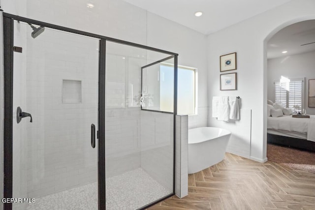 891 Dewsbury Way, El Paso, TX 79928 - bathroom with connected bathroom, a freestanding bath, a stall shower, and recessed lighting