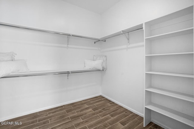 891 Dewsbury Way, El Paso, TX 79928 - walk in closet with dark wood-style floors
