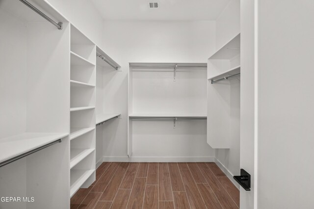 895 Dewsbury Way, El Paso, TX 79928 - walk in closet with dark wood finished floors