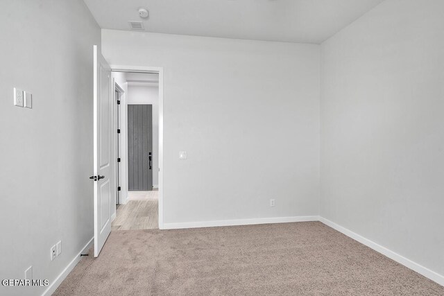 899 Dewsbury Way, El Paso, TX 79928 - empty room with carpet, baseboards, and a smoke detector