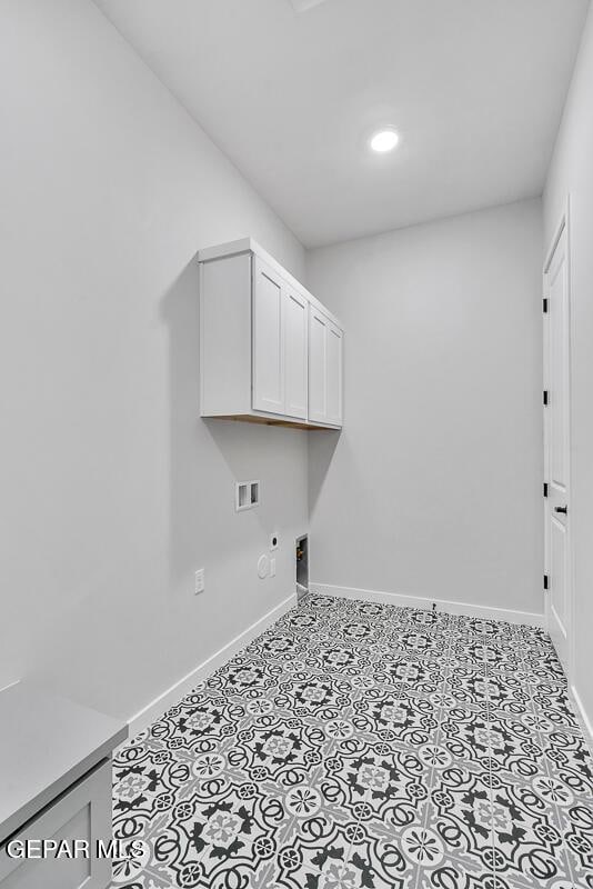 899 Dewsbury Way, El Paso, TX 79928 - laundry room with hookup for an electric dryer, cabinet space, hookup for a washing machine, gas dryer hookup, and baseboards