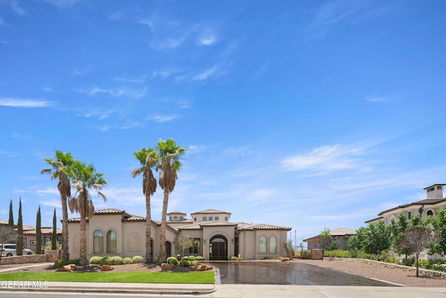 6572 Tuscany Ridge Dr, El Paso, TX 79912 - view of front facade featuring stucco siding and a tile roof