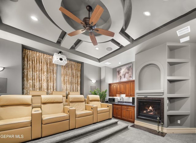 6572 Tuscany Ridge Dr, El Paso, TX 79912 - carpeted cinema featuring a ceiling fan, built in shelves, and recessed lighting