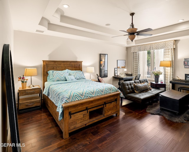 6572 Tuscany Ridge Dr, El Paso, TX 79912 - bedroom with a tray ceiling, wood finished floors, a ceiling fan, and recessed lighting