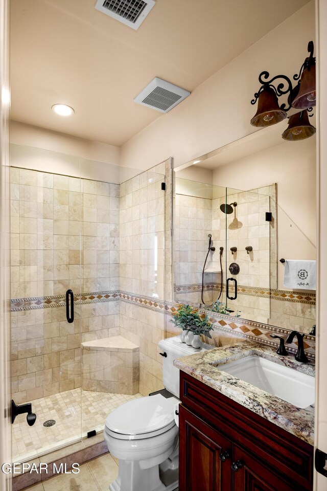 6572 Tuscany Ridge Dr, El Paso, TX 79912 - bathroom featuring vanity, a shower stall, tile patterned flooring, and recessed lighting