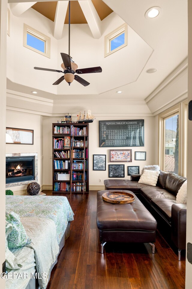 6572 Tuscany Ridge Dr, El Paso, TX 79912 - bedroom featuring a glass covered fireplace, wood-type flooring, recessed lighting, and crown molding
