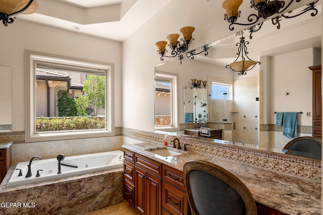 6572 Tuscany Ridge Dr, El Paso, TX 79912 - full bath with a shower stall, vanity, and a jetted tub