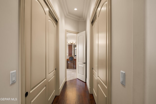6572 Tuscany Ridge Dr, El Paso, TX 79912 - corridor featuring dark wood-type flooring, crown molding, and recessed lighting