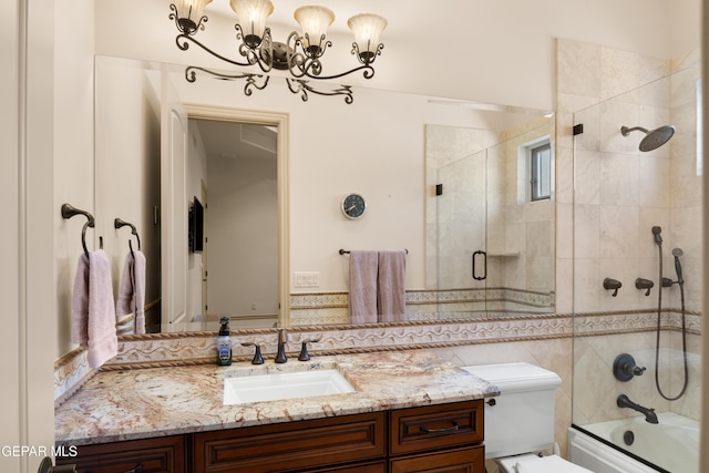 6572 Tuscany Ridge Dr, El Paso, TX 79912 - bathroom featuring vanity, a chandelier, and enclosed tub / shower combo