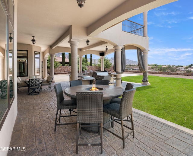 6572 Tuscany Ridge Dr, El Paso, TX 79912 - patio / terrace with outdoor dining space, a yard, and a patio area