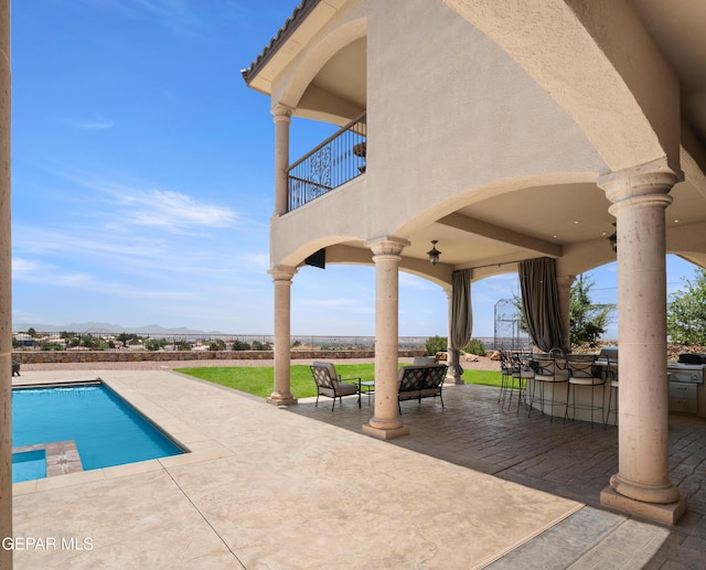 6572 Tuscany Ridge Dr, El Paso, TX 79912 - view of pool featuring a patio, a mountain view, and grilling area