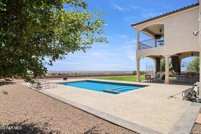 6572 Tuscany Ridge Dr, El Paso, TX 79912 - view of swimming pool featuring a patio and a pool with connected hot tub