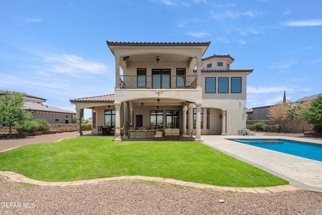 6572 Tuscany Ridge Dr, El Paso, TX 79912 - rear view of house featuring a balcony, an outdoor living space, a patio, and stucco siding